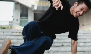 a young man breakdancing