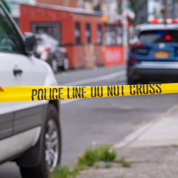 Police tape blocks a city street following a violent incident. (Photo: Shutterstock)