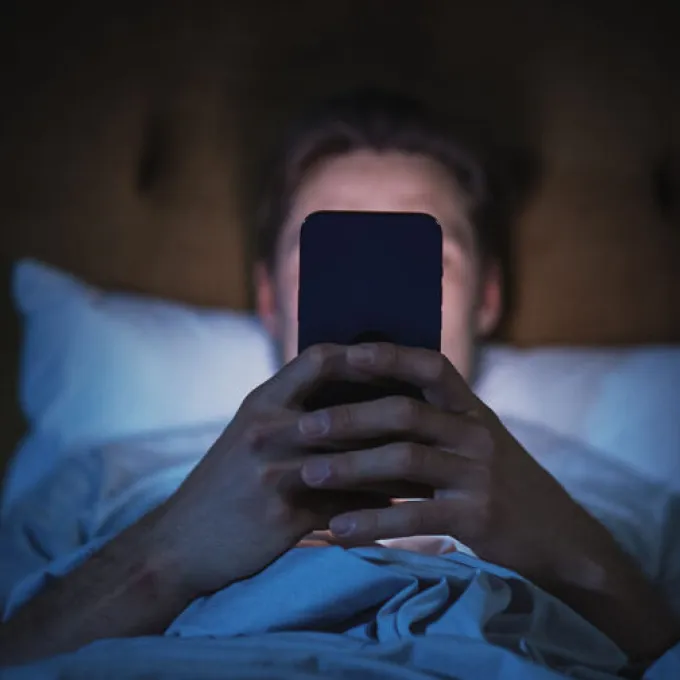 WashU researchers led a population-based study of thousands of college students showing that a phone app with text coaching increased access to care and eased symptoms of depression, anxiety and eating disorders. (Photo: Shutterstock)